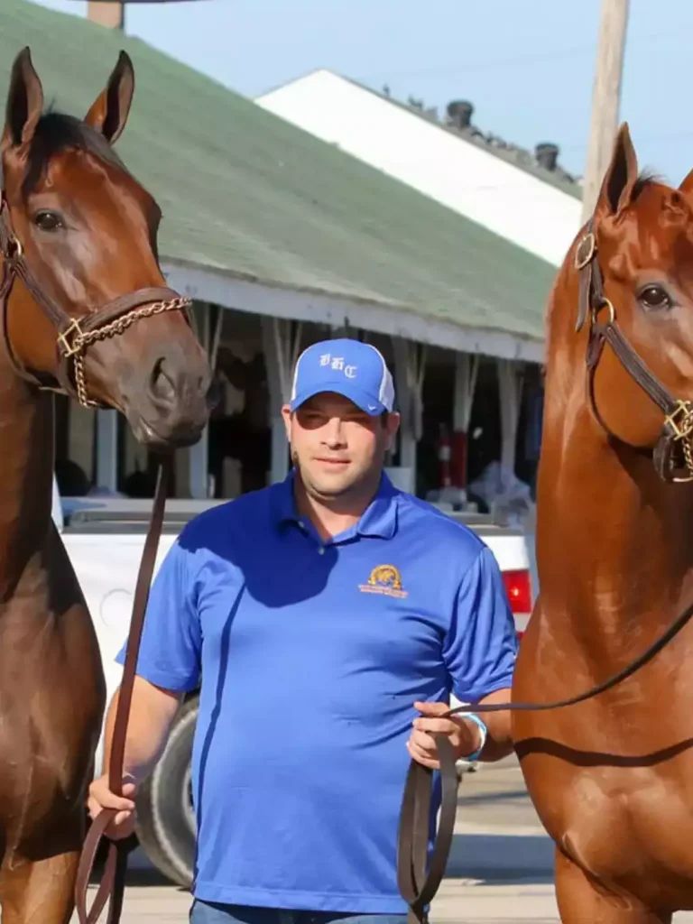 Horse trainer Brad Cox between two of his horses. Picture used by MangaWavePEMF
